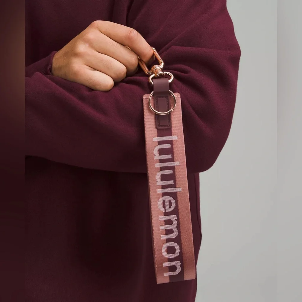 Lululemon Never Lost Keychain Wordmark- Garnet/Spiced Chai/Rose Gold